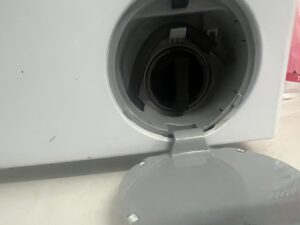 kiểm tra ống thoát nước máy giặt
